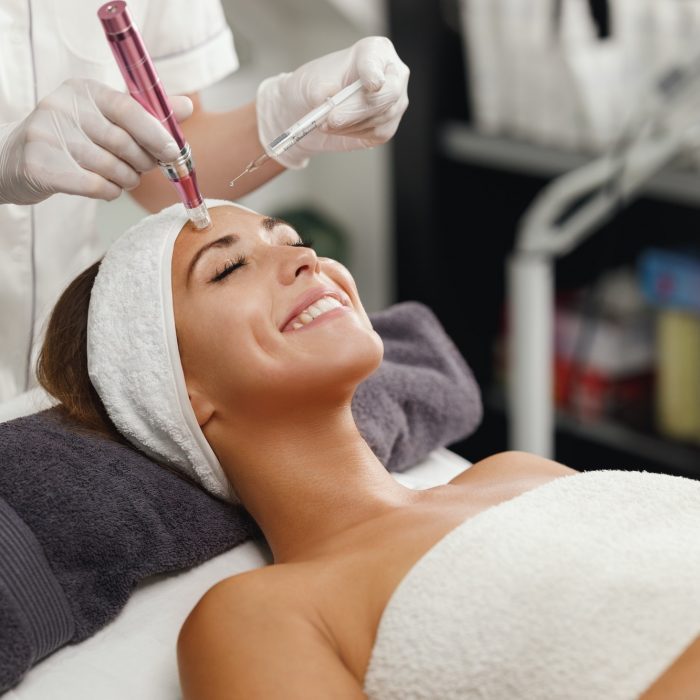 Dermapen Micro-needling Treatment In A Beauty Salon